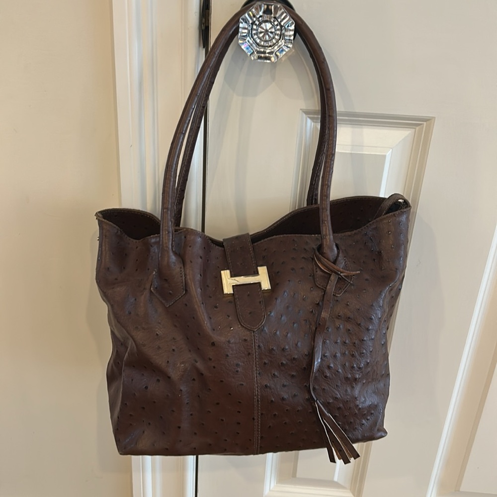 Courage B Brown Leather Shoulder Bag. Roomy and holds a decent amount of items.